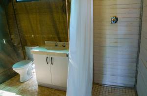 a bathroom with a sink and a toilet at The Lineage Lodge in Elgin +43 photos