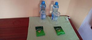 two bottles sitting on top of a table at Royal pine cottage hotel in Ruiru