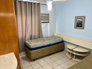 a small room with a bed and a window at CRCN - Eldorado Thermas Park in Caldas Novas +78 photos