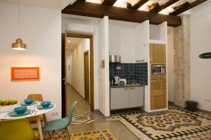 Kuchyň nebo kuchyňský kout v ubytování Eco-Friendly Apartments