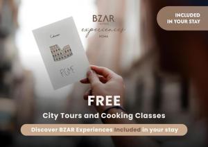 a hand holding a card with a city tours and cooking classes at The Britannia Hotel in Rome
