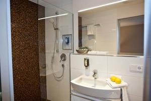 Koupelna v ubytování Hotel-Restaurant Arneggers Adler