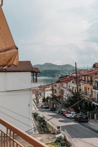 a view from a balcony of a street with buildings at Angelikis Maisonette in Kastoria