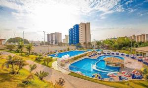 an overhead view of a swimming pool in a city at CRCN - Golden Dolphin Grand Hotel in Caldas Novas