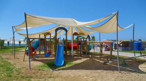 a playground with a tent and a play structure at LRS Hotels Port River Hotel & Spa - Ultra All Inclusive in Side