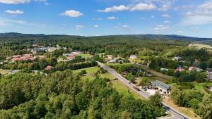 an aerial view of a small town in the forest at Nota Bene Pokoje Gościnne Polanica Zdrój in Polanica-Zdrój