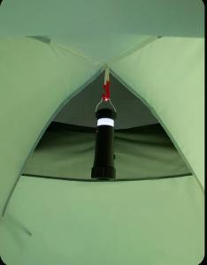 a close up of a white umbrella at Camping tents rent in Karakol
