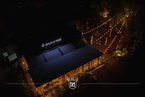 an overhead view of a building at night with lights at Resort Maja e Zezë in Gnjilane
