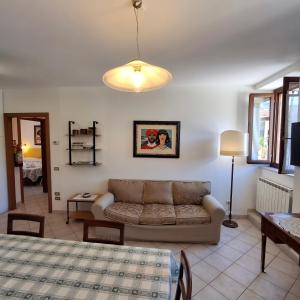 a living room with a couch and a table at Casa Stella in Sarnano