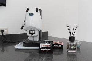 a sewing machine sitting on top of a counter at New Naxian Holidays in Giardini Naxos