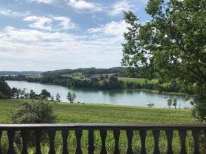 a view of a river from a bench at domek Kaszuby nad jeziorem in Chmielno
