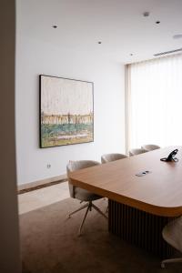 a conference room with a table and chairs at Oporto Fly Hotel in Maia +58 photos