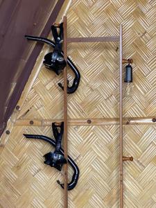 a set of two lights on a wicker floor at Cabang Campsite - Private Island Experience in San Vicente +73 photos