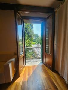 an open door to a room with a view at Antica Dimora Confine in Mira