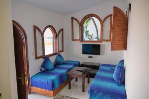 TV/trung tâm giải trí tại La Planque - Appart Hôtel - Vue sur mer