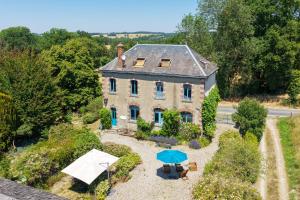 an aerial view of a house with a garden at L'école buissonnière chambres et table d'hôtes in La Celle-Dunoise