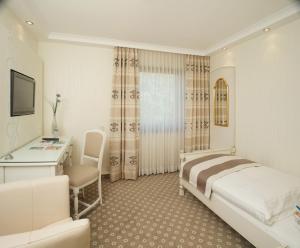 Postel nebo postele na pokoji v ubytování Hotel-Restaurant Arneggers Adler