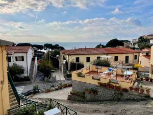 a view from the balcony of a house at Rosmarino Apartment in Seccheto
