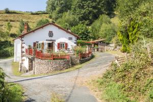 a house on the side of a road at Sarahandia in Aldudes