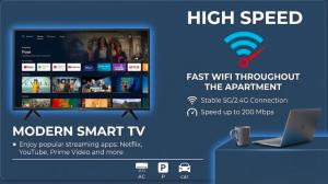 an advertisement for a modem smart tv with a laptop on a desk at Nexus Apartment in Podgorica