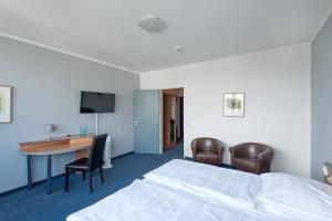 Hotel Sedes Berlin tesisinde bir televizyon ve/veya eğlence merkezi