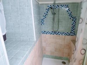 a bathroom with a shower with a sink and a toilet at Mission Holiday in Penna in Teverina