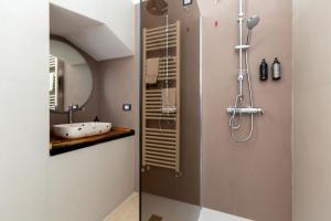 a bathroom with a sink and a shower at Domus Sagari in Presicce +40 photos