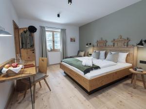 Postel nebo postele na pokoji v ubytování Forstnerwirt hotel | stubn | biergarten + 83 fotografií