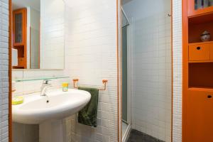 a bathroom with a sink and a mirror at Casa Edera - Villa Storica in Viagrande