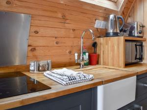 a kitchen with a sink and a counter top at Selker View-Uk1397 in Corney