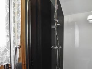 a shower in a bathroom with a glass door at Selker View-Uk1397 in Corney +6 photos