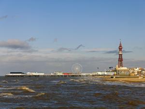 a pier with a clock tower in the water at Wharfdale Lodge in Thornton +19 photos