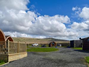 a view of a barn with a car parked in a driveway at Barn Scar-Uk1394 in Corney