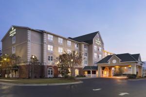 a rendering of a hotel with a parking lot at Country Inn & Suites by Radisson, Summerville, SC in Summerville
