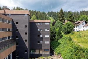 an aerial view of a building at Schanzenblick mit Sauna und Pool in Schönwald