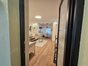a view of a living room from a door at Vukajlo Petit in Belgrade +5 photos