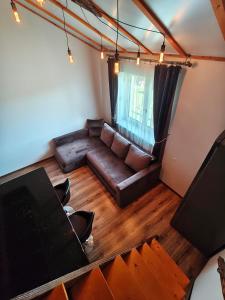 an overhead view of a living room with a couch at Zeigių apartamentai in Normantai