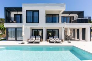 an image of a villa with a swimming pool at Villa Loparia in Lopar