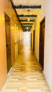 an empty hallway in an office building at Lowfare Hotels Bengaluru in Bangalore
