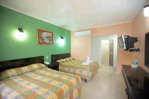 Una cama o camas en una habitación de Hotel Principe