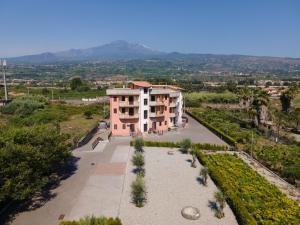 an aerial view of a building with a garden at Teresan Homestay in Mascali