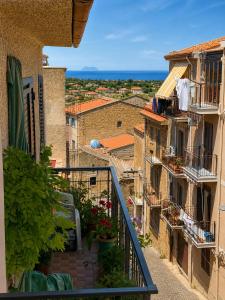 a view from a balcony of an apartment building at O'Chianu in Lascari