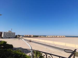 a view of the beach from a balcony at The Blue House in Safaga