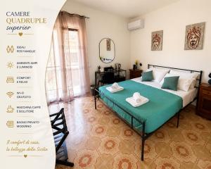 a room with a bed and a sign for a hotel at O'Chianu in Lascari