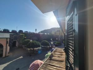 a balcony of a building with a view of a street at Rezzano 12 in Bonassola