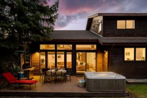 a house with a patio with a table and chairs at Ski Beaver Creek 4min Vail 10min in Avon