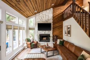 a living room with a couch and a fireplace at Ski Beaver Creek 4min Vail 10min in Avon +41 photos