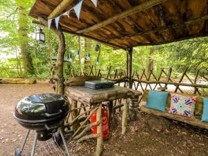 a grill and a helmet sitting in a cabin at The Moroccan Bell Tent in Newbury