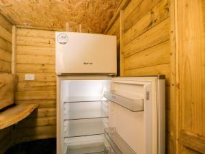 a refrigerator with a box on top of it at The Moroccan Bell Tent in Newbury