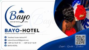 a flyer for a bayo hotel with a girl in a red dress at BAYO-HOTEl in Vaudreuil